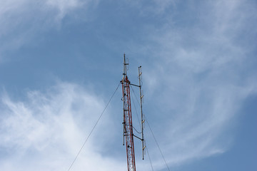 Antenna icon. Television antenna and blue sky