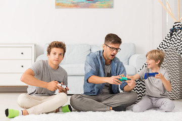 Brothers playing video games