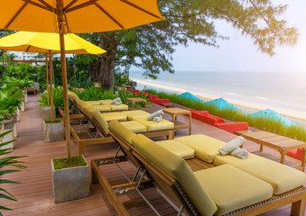 Wood beach chair  in the resort near sea at summer and relaxing