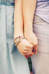 Loving young beautiful couple on a date in park. summer warm weather