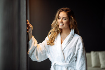 Beautiful glamorous woman in bathrobe - obrazy, fototapety, plakaty