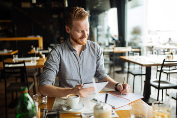 Businessman taking notes