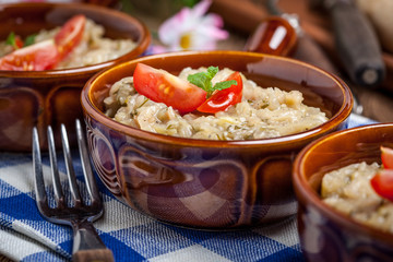 Fried cabbage greens and onion in wooden table.