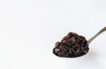 Onions, caramelised on a spoon