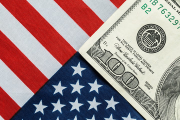 Fototapeta premium American dollar on the American flag.