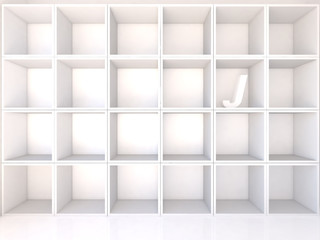 Empty white shelves with J