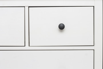 white wooden chest of drawers