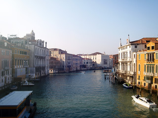 Canal in Venice populated by boats