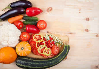 ripe vegetables on a wooden table