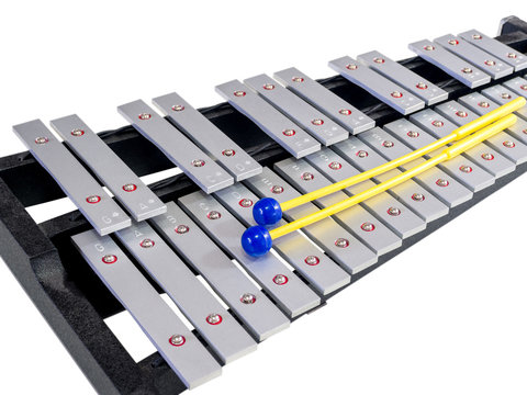 Xylophone with mallets on isolated white background, selective f