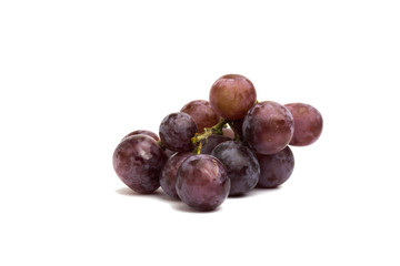 The big purple grapes on a white background.