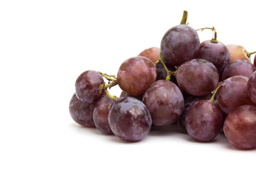 The big purple grapes on a white background.