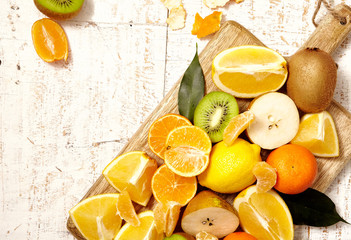 Preparing tropical, citrus fruits for organic juice. ingredients for healthy breakfast. Top view....