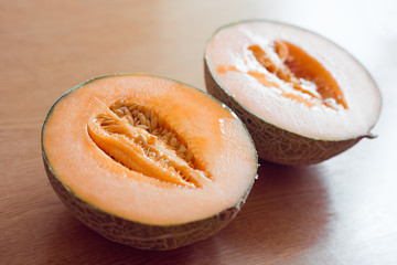 cantaloupe melon slices isolated on white background