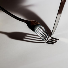Knife and fork in a sad relationship