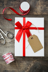 White gift boxes on wooden table

