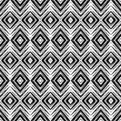 Abstract grunge rhombus seamless vector pattern. Tribal background.