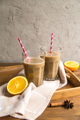 Fototapeta premium cup of cocoa with milk and cinnamon