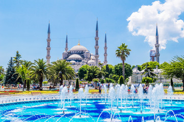 The Sultan Ahmed Mosque (Blue Mosque) and fountain view from the Sultanahmet Park in Istanbul,...