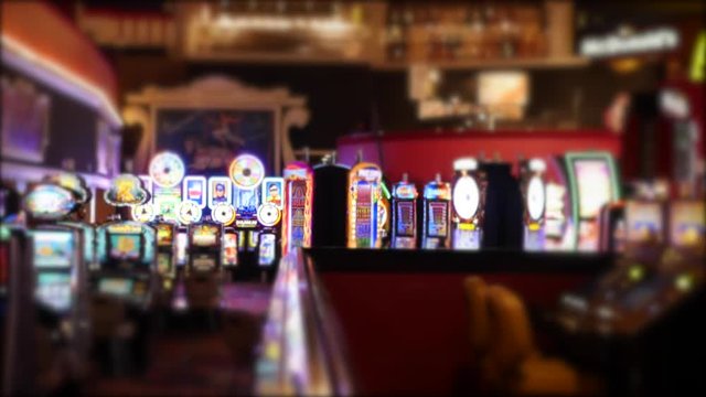 Static shot of people gambling in a casino