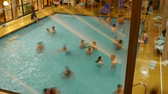 TImelapse of people swimming in pool
