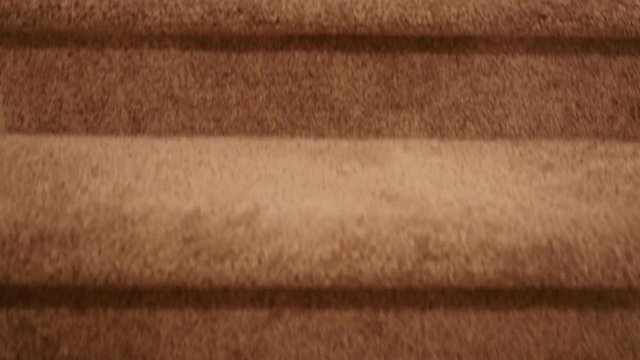 Gimbal shot traveling up stairs
