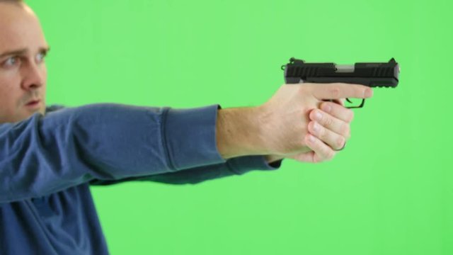 Green screen shot of a shooter with a 22 pistol