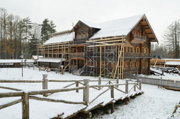 Construction of a wooden hut.