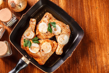 Raw chicken legs marinated