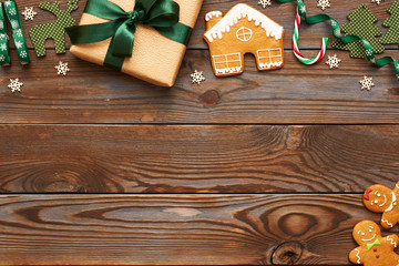 Christmas present and decoration on wooden background