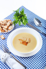 Dried croutons on white plate served on the table