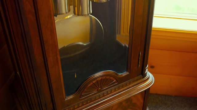 A cool old grandfather clock in the livingroom