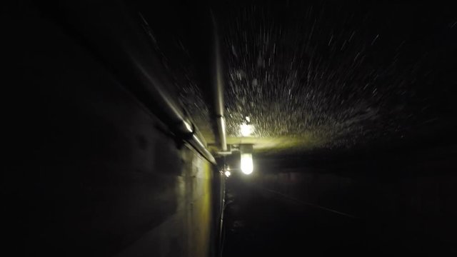 Camera traveling through a dark coal mine at glace bay