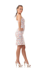 girl in a dress on a white background