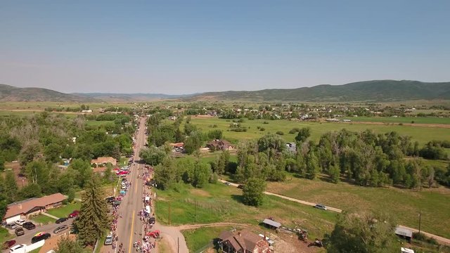 Aerial shot of families waiting for a parade to start