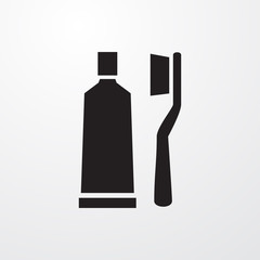 toothbrush and toothpaste icon illustration