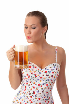 sexy young woman holding glass of beer