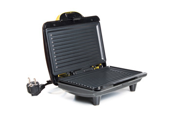 Domestic generic electric panini maker, angled view with the hin