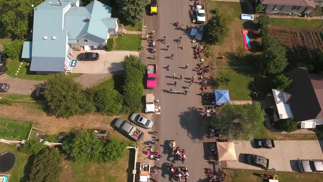 Aerial shot of families watching the july 4th parade