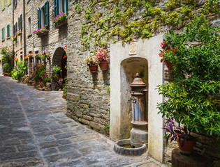 Fototapeta premium Italian street in a small provincial town of Tuscan