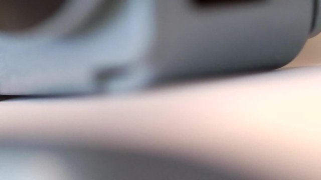 Paper getting punched with a three hole punch