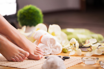 Obraz na płótnie Canvas Closeup photo of a female feet at spa salon