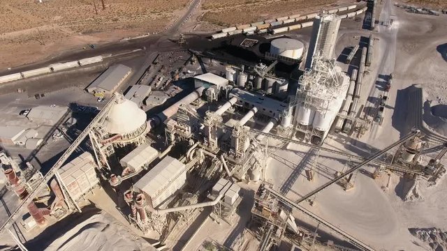 A cool high aerial shot of large industrial mining plant