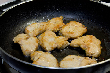 chicken fillet in a frying pan