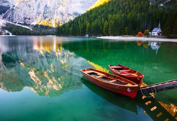 Papier Peint photo Lavable Lac / étang Boats on the Braies Lake ( Pragser Wildsee ) in Dolomites mounta