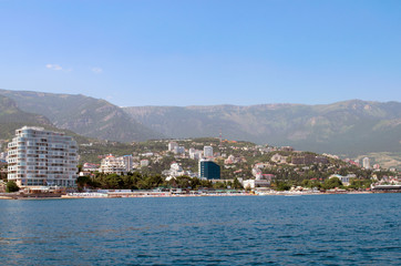 Fototapeta na wymiar view from the sea on the promenade of Yalta Crimea