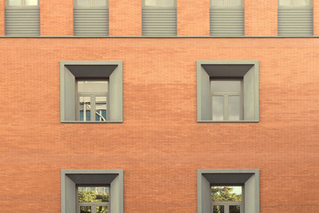 Fototapeta na wymiar Abstract facade. Close up of a building facade with windows