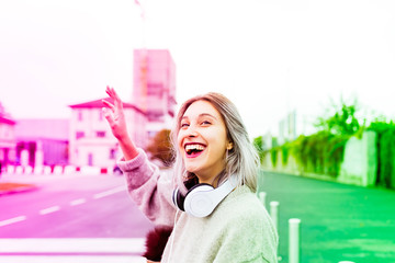 Young beautiful caucasian purple grey hair woman outdoor in the city, overlooking smiling -...