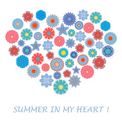 Nice picture of colorful flowers laid out in the shape of a hear