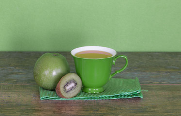 green cup with juice